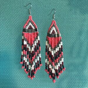 Coral beaded tribal design earrings
